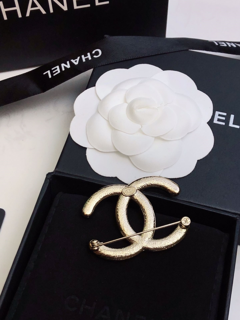 Ch**el brooches